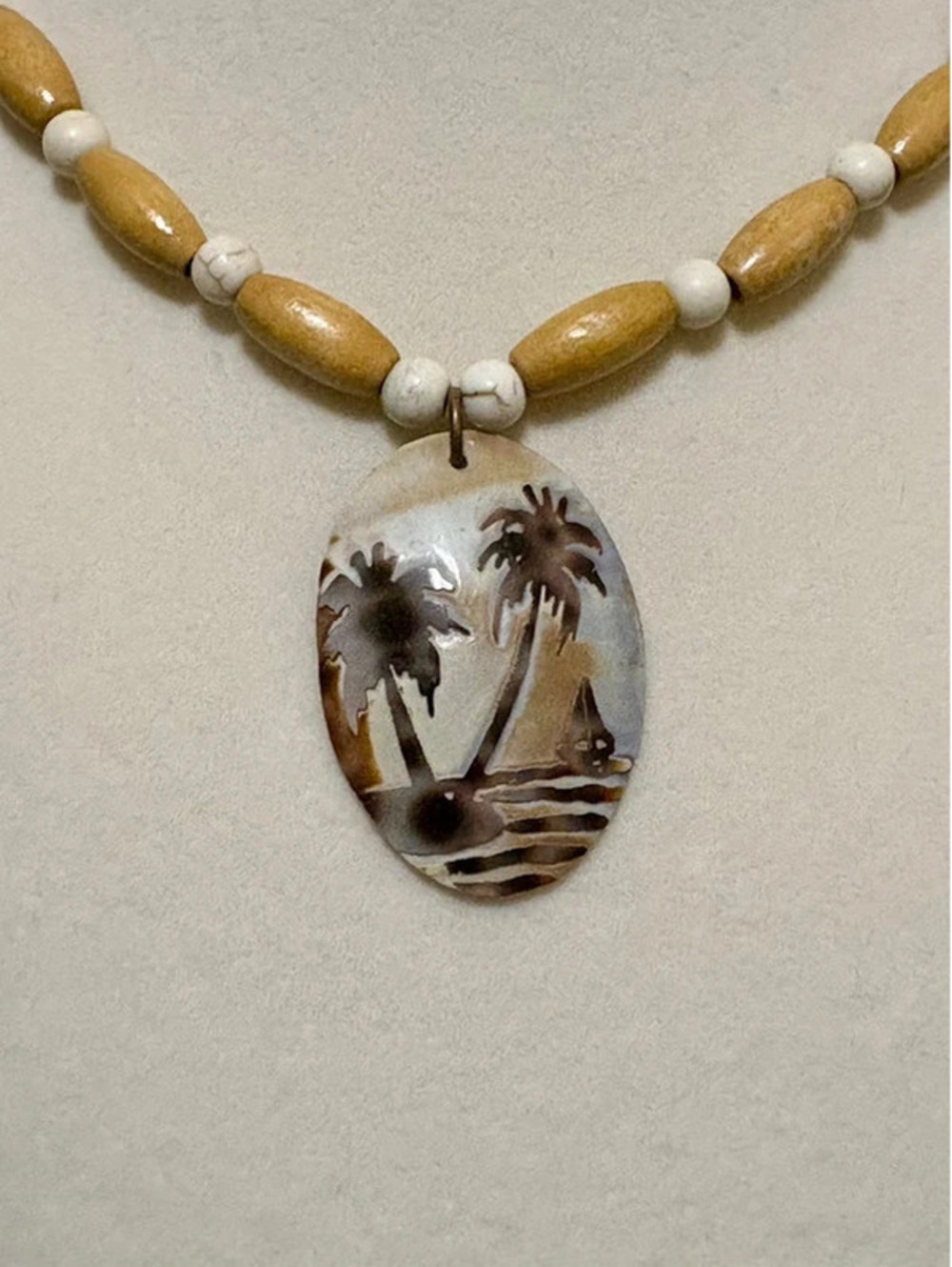 Wood beaded tropical style necklace with shell pendant
